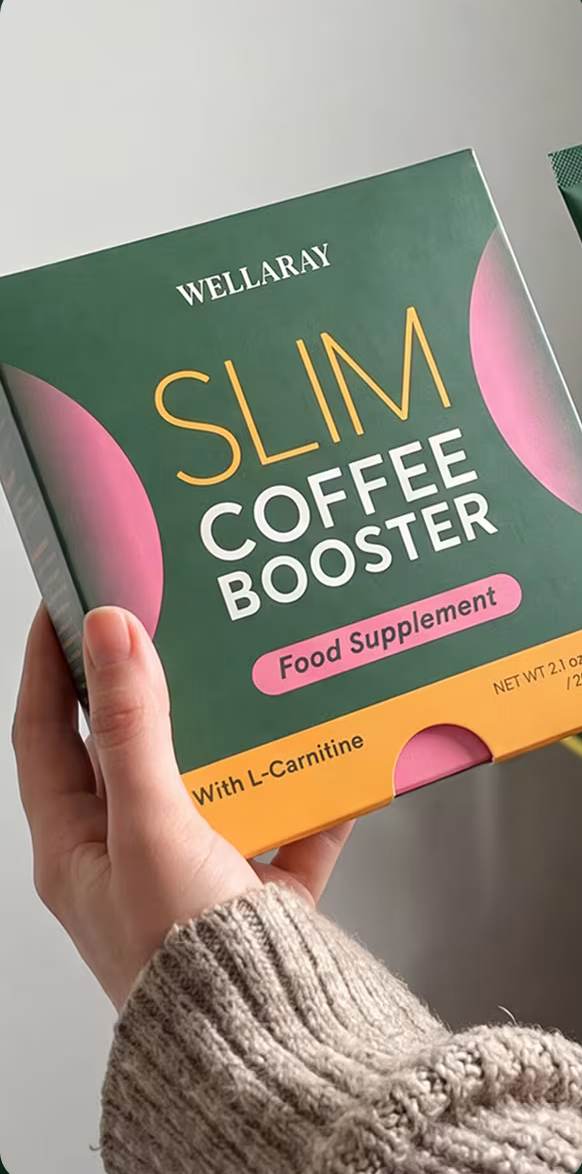 Hand holding a box of Wellaray Slim Coffee Booster